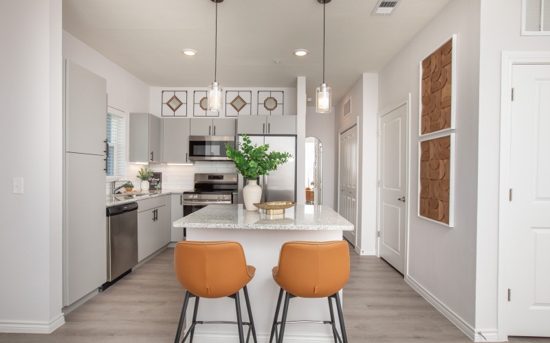 Open-concept living, kitchen, and dining at Arbor Rose Porter pet-friendly apartments in Northeast Houston.