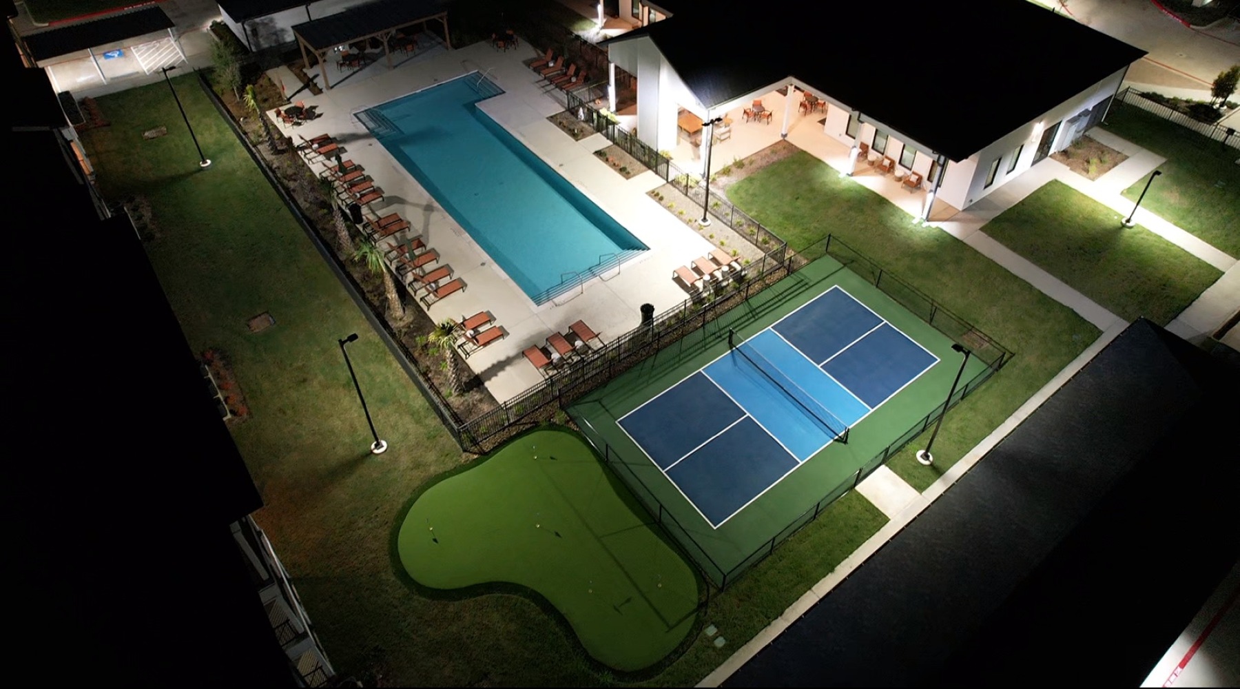 putting green, pickleball court, and pool at arbor rose porter