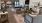 a clubroom with a couch and chairs