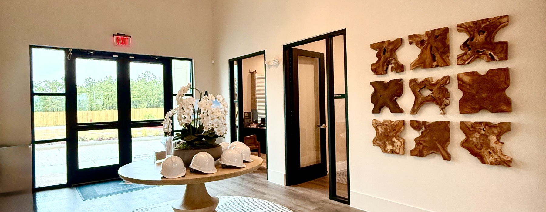 entry with flowers at arbor rose at porter apartments