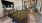a clubroom with a pool table and chairs